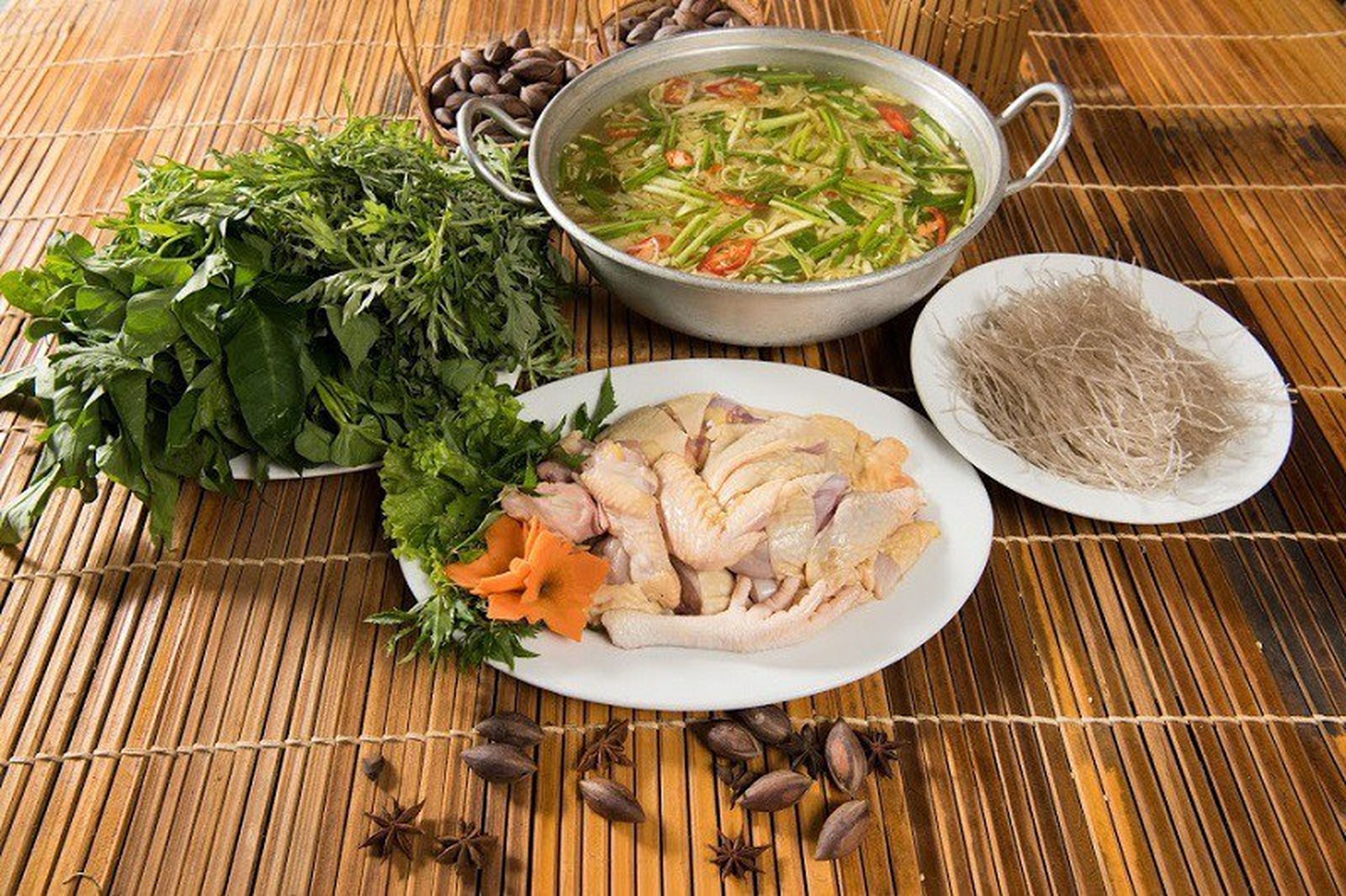 Visit Quang Ninh to Enjoy Delicious and Nutritious Tien Yen Chicken Hotpot Cooked with Rice Wine Lees - Hình 8