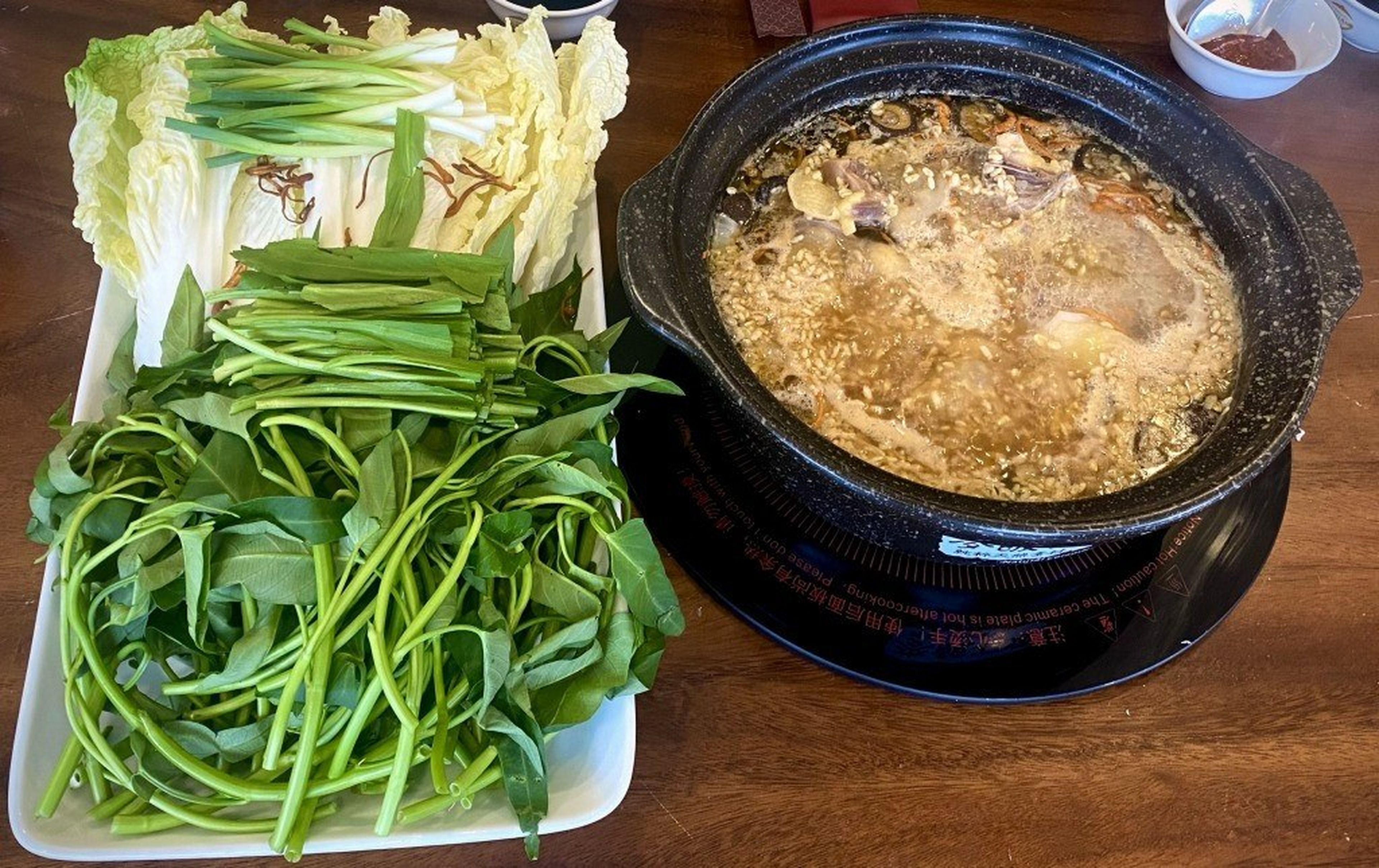 Visit Quang Ninh to Enjoy Delicious and Nutritious Tien Yen Chicken Hotpot Cooked with Rice Wine Lees - Hình 7
